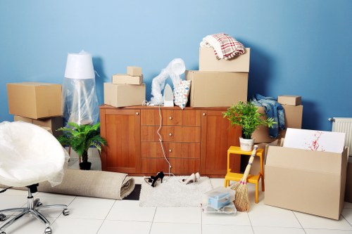 Packed boxes and moving van ready for Hydepark removals