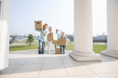 Moving boxes and furniture prepared for a Hydepark removal