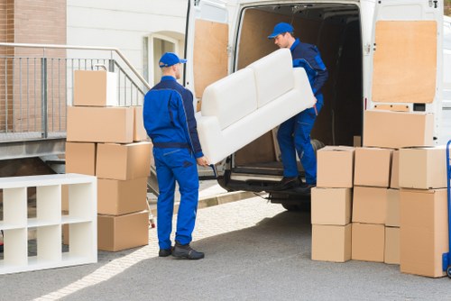 Office relocation planning in Hydepark with desks and moving boxes
