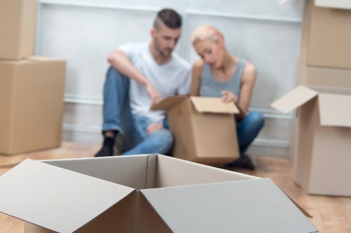 Packed boxes and furniture ready for transport